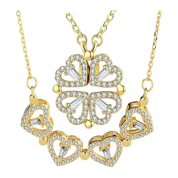 Zlatna ogrlica ClaraHeart s kristalnim srcem na elegantnoj bijeloj pozadini.