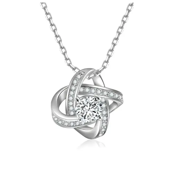 Ogrlica Serelina s prepletenim motivom elipsa i sjajnim kristalom na bijeloj podlozi.