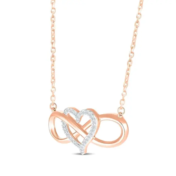 Detaljan prikaz roza zlatne ogrlice s kristalnim privjeskom srca i beskonačnosti